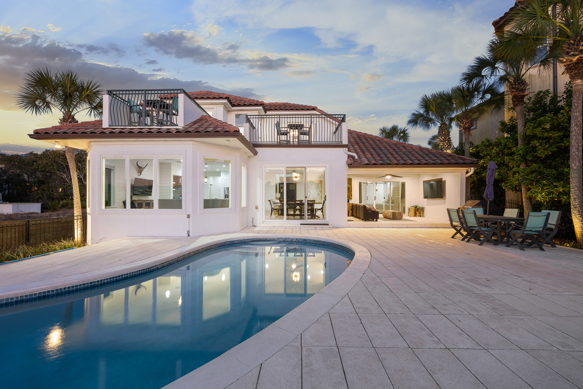 Exterior property at dusk by Leland Visuals